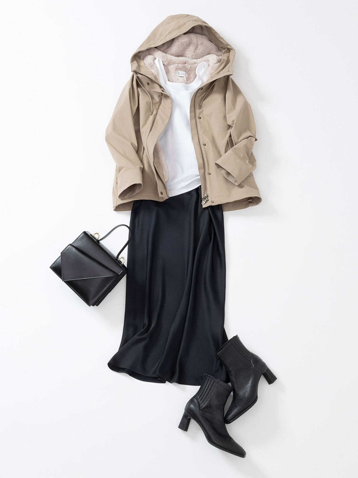 サテンスカートにカジュアルなアウターを合わせたコーデ