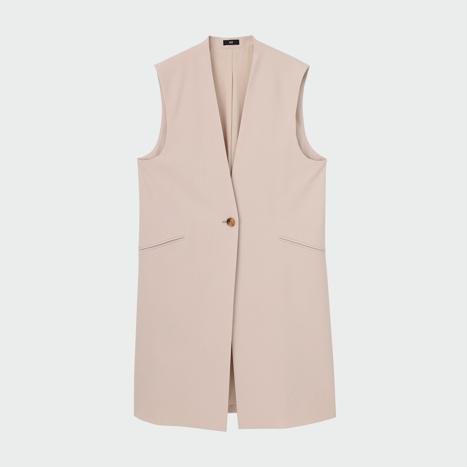 ミドル丈のベージュのジレ